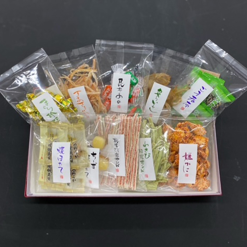 おつまみ詰合せ4(小袋10品化粧箱入り:ちーず焼ほたて、梅味胡麻サンド、わさび胡麻サンド、ごまわかめ、やわらか焼帆立、まぐろ珍味、するめさきいか、こんぶあめ、炙りいわし、姫かに)